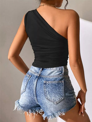 Black asymmetrical ruched tank top with one shoulder strap and a draped neckline.