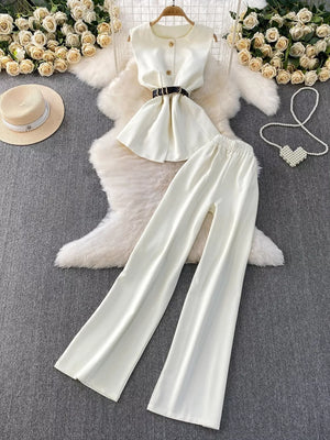 Elegant white belted two-piece set with pockets and wide-leg pants