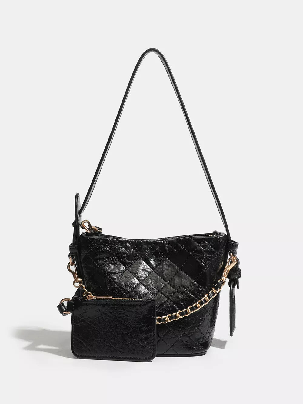 Black quilted bucket bag with chain accent and matching coin purse