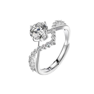 Sterling silver ring with moissanite and accent stones, adjustable band.