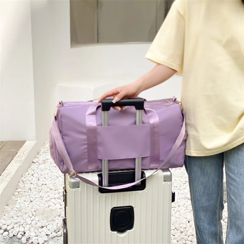 Sport Luxe Weekend Holdall duffel bag in Pink Purple with trolley sleeve and shoulder strap.