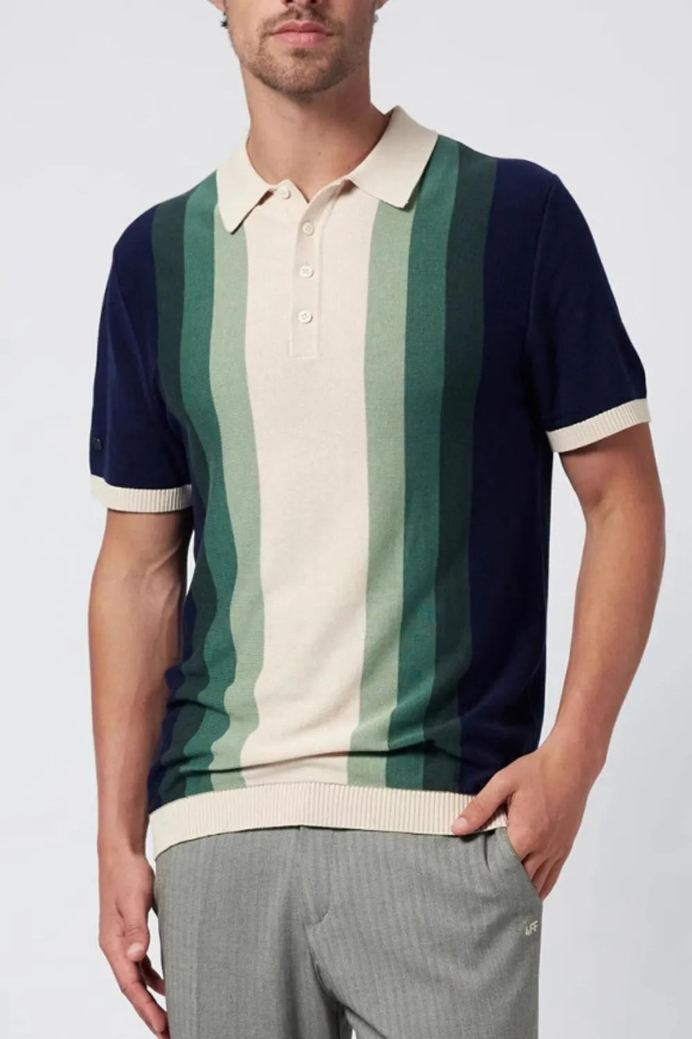 Men's knit polo shirt with vertical gradient stripes in navy, green, and cream.