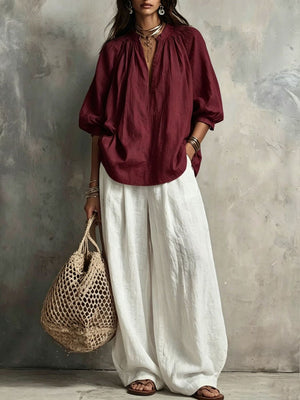 blouse and wide-leg pants set in burgundy featuring pocketed and relaxed fit