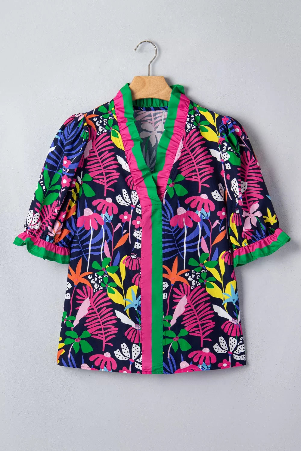 Floral frill v-neck shirt with striped accents and short sleeves.