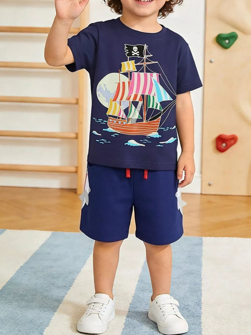 Boys' navy cotton two-piece set with pirate ship graphic tee and shorts.