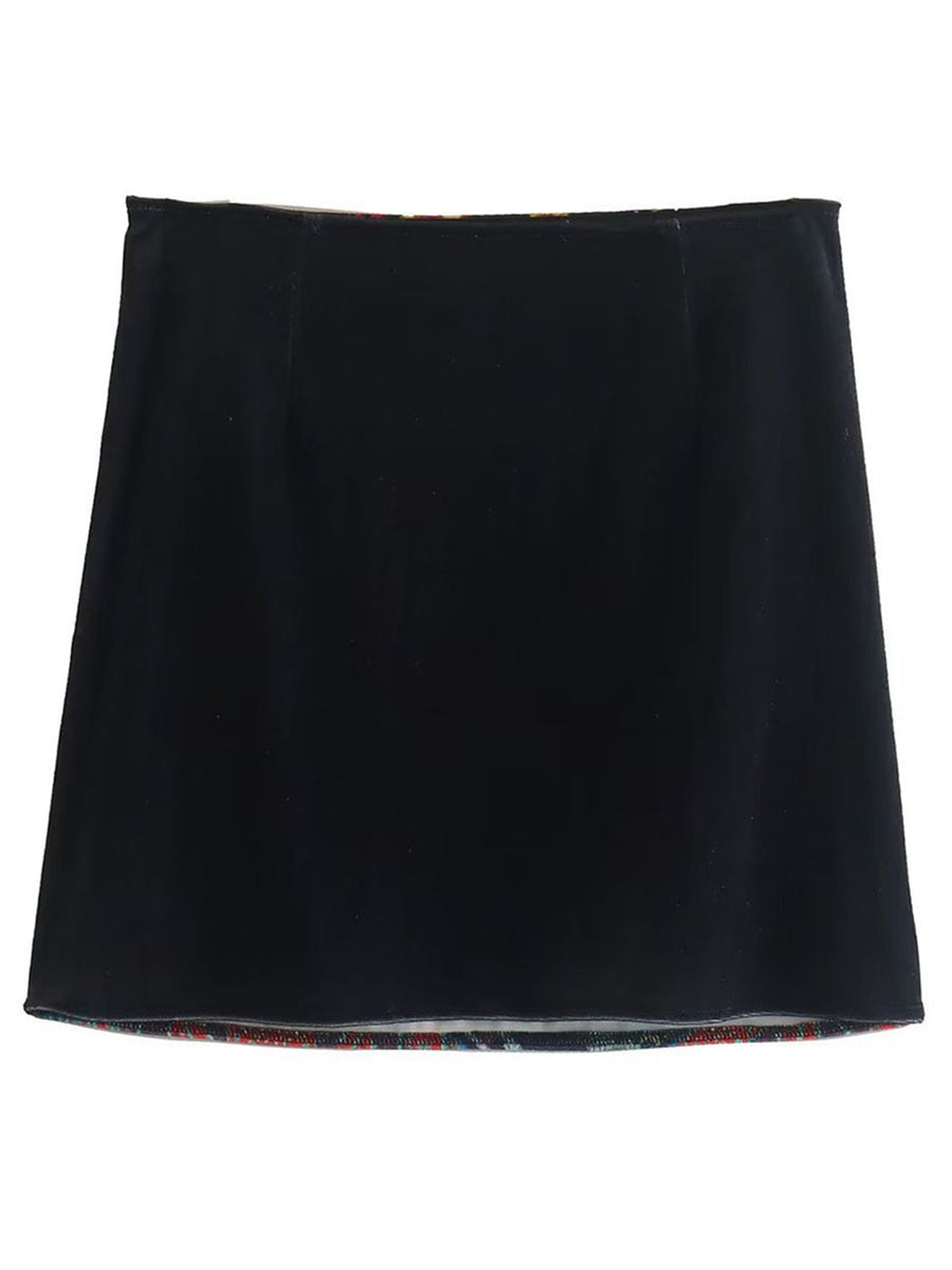 Black velvet mini skirt with embroidered patchwork trim