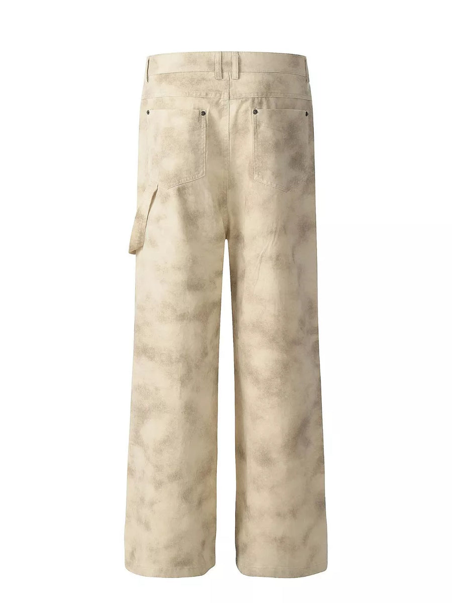 Men's beige wide-leg sweatpants with distressed finish and utility pocket.