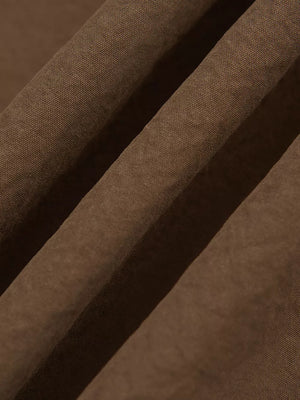 Brown relaxed fit sweatpants with side stripe detail.