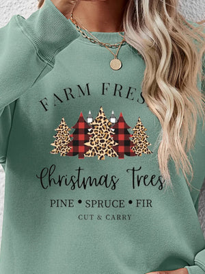 Crewneck sweatshirt in Sage green with Christmas trees graphic, buffalo plaid and leopard print detail.