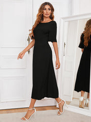 Black midi dress with short sleeves and a keyhole back detail.