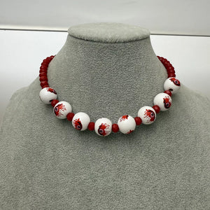 necklace featuring graphic in Burgundy with Resin,Zinc alloy,wood Care instructions: While wearing the pearl jewelry, avoid