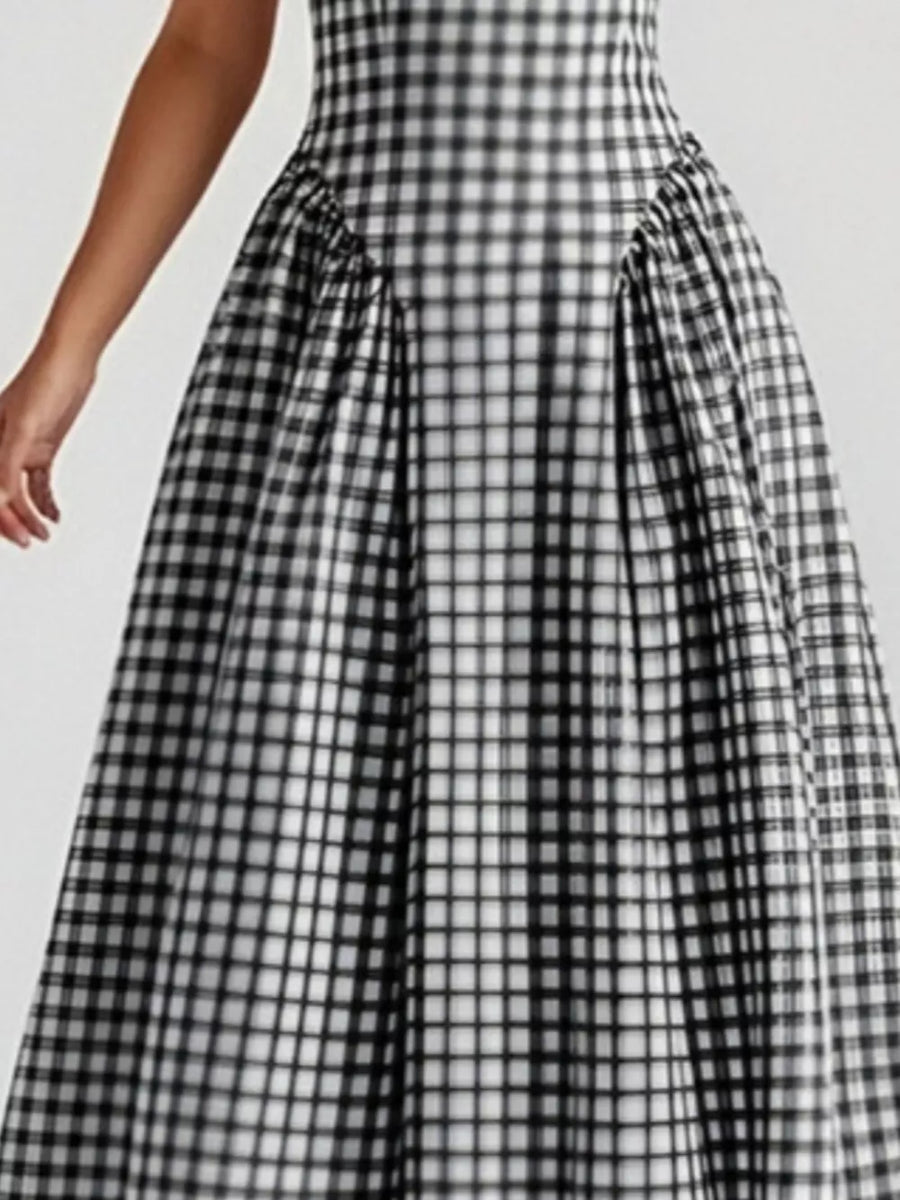 Plaid square neck midi dress in black with a-line skirt and gathered detail.