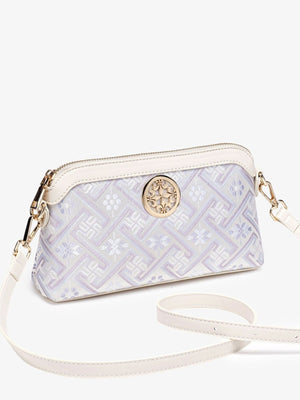 crossbody bag featuring geometric in light purple with PU Leather Imported Size &amp texture