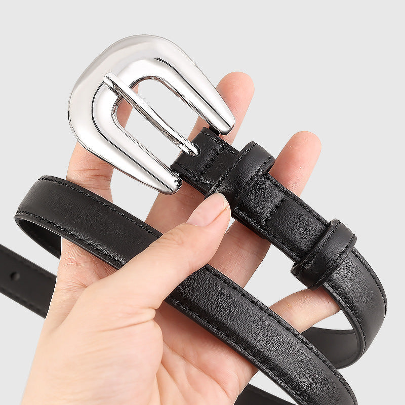 Black leather belt with a polished silver buckle and stitched detail