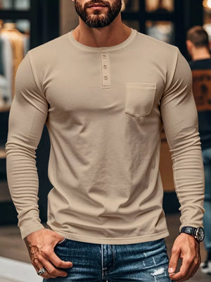 Khaki long sleeve henley t-shirt with button placket and chest pocket.