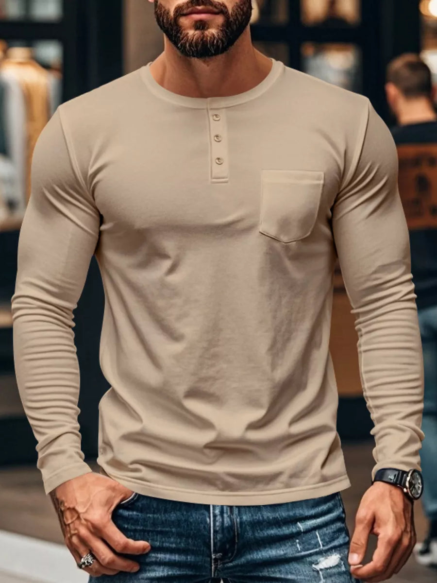 Khaki long sleeve henley t-shirt with button placket and chest pocket.
