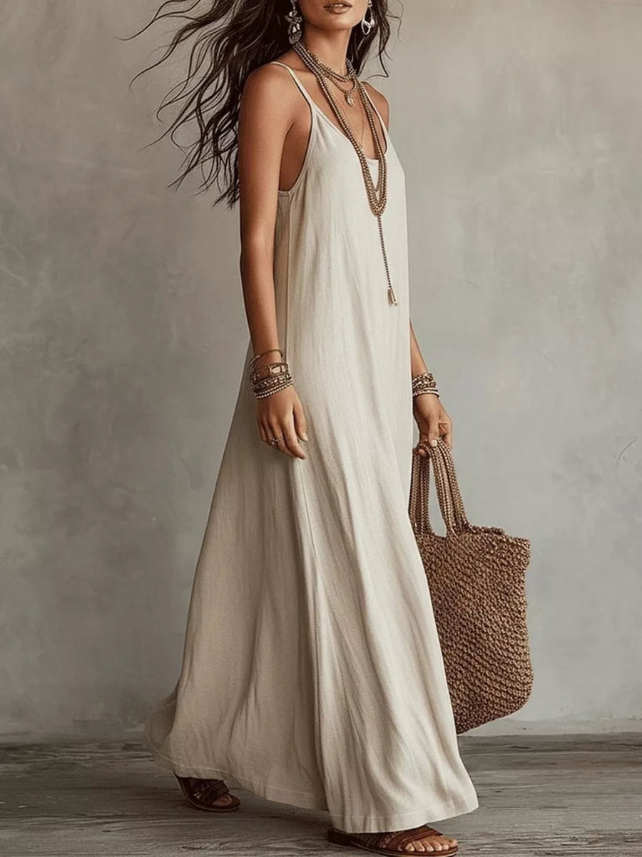 100% polyester Care instructions: Machine wash cold maxi dress in Black with loose silhouette