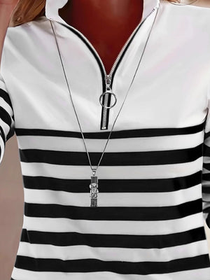 white t-shirt featuring zipper and striped