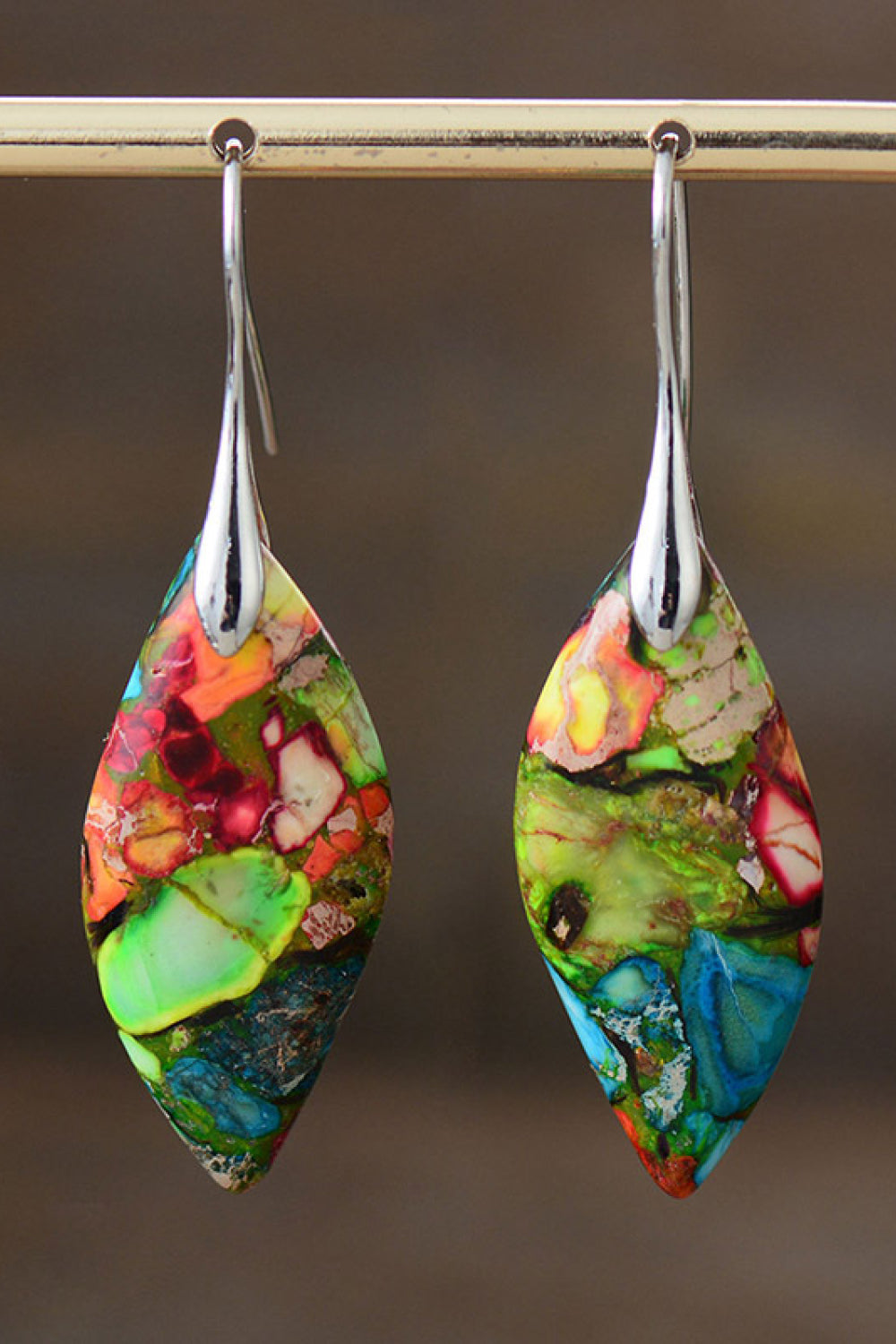 Multicolor gemstone kaleidoscope dangle earrings with 14K gold-plated hooks.