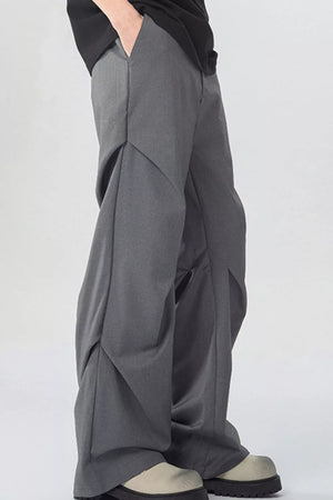 Modern gray wide-leg sweatpants with pockets, relaxed fit, casual style.