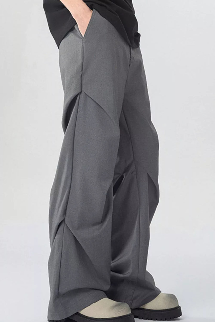 Modern gray wide-leg sweatpants with pockets, relaxed fit, casual style.