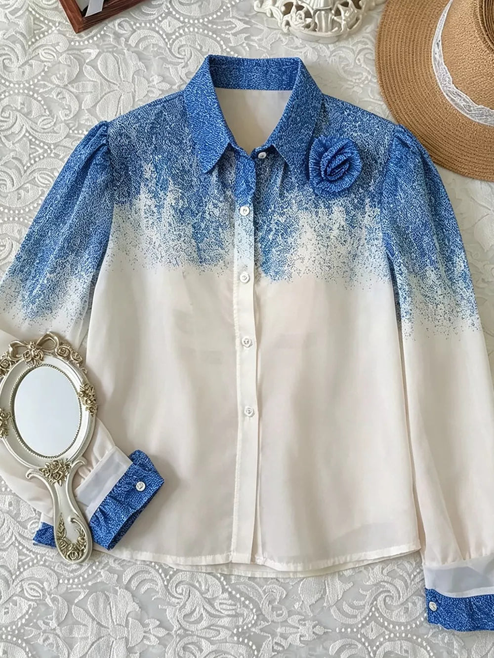100% polyester Care instructions: Machine wash cold button-up shirt in Blue with regular silhouette