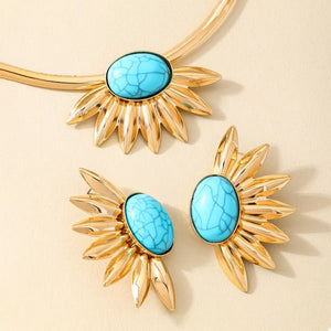 Gold sunflower jewelry set with turquoise stones, including necklace and earrings.