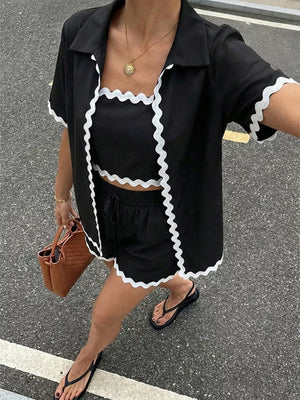 Black cami shorts set with scalloped trim, collared short sleeve shirt, and drawstring shorts.