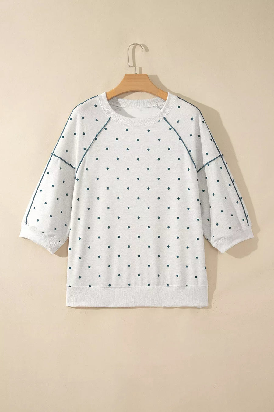 100% polyester Care instructions: Machine wash cold pullover sweater in Light Gray with relaxed silhouette