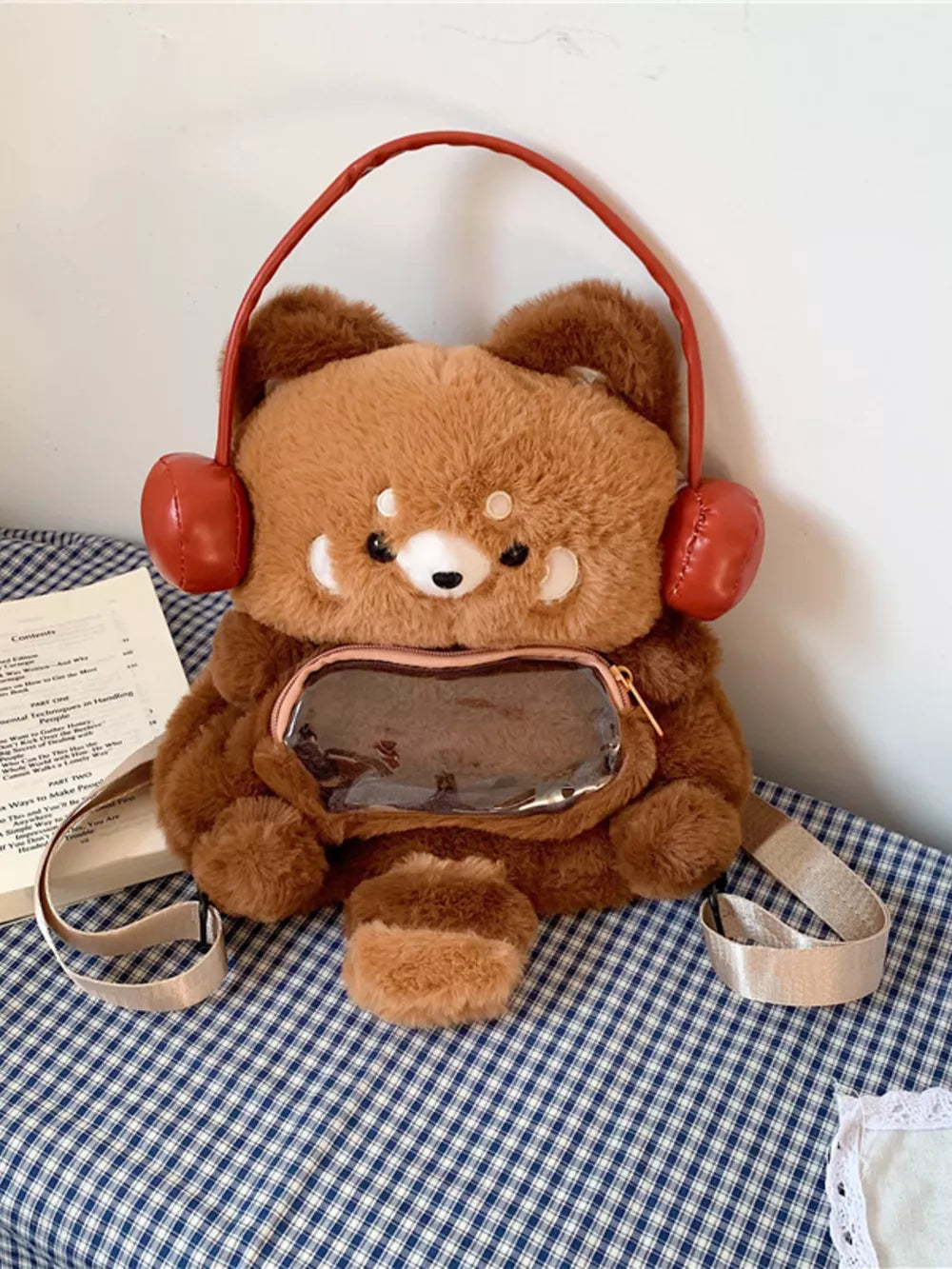 Mini plush cat backpack bag in caramel with red headphones and clear front pocket