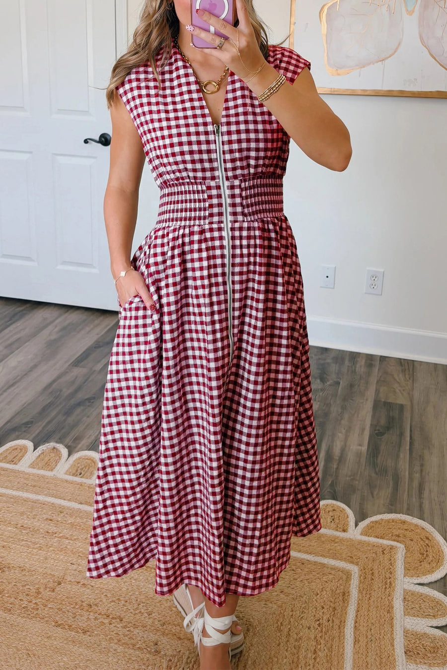 Gingham zip-front midi dress in cerise with elastic waist and pockets.