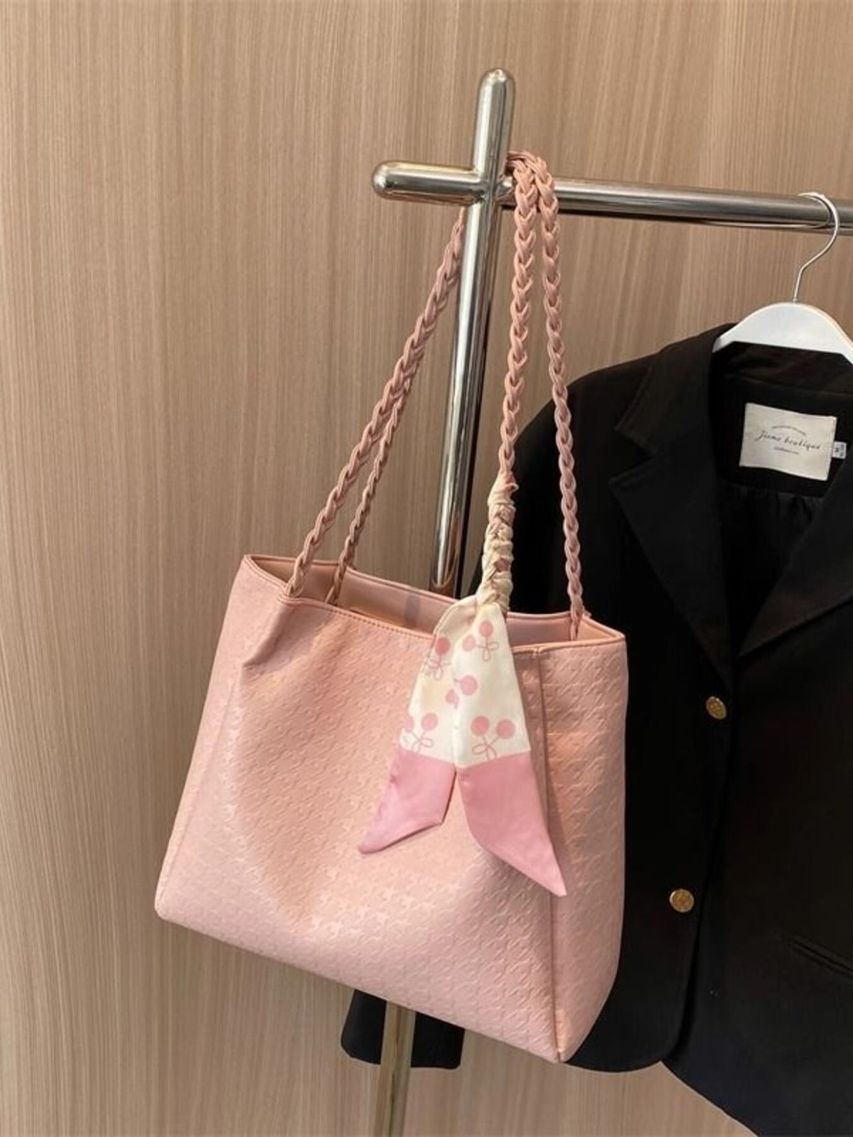 Blush pink shopper bag with braided handle and cherry print scarf detail