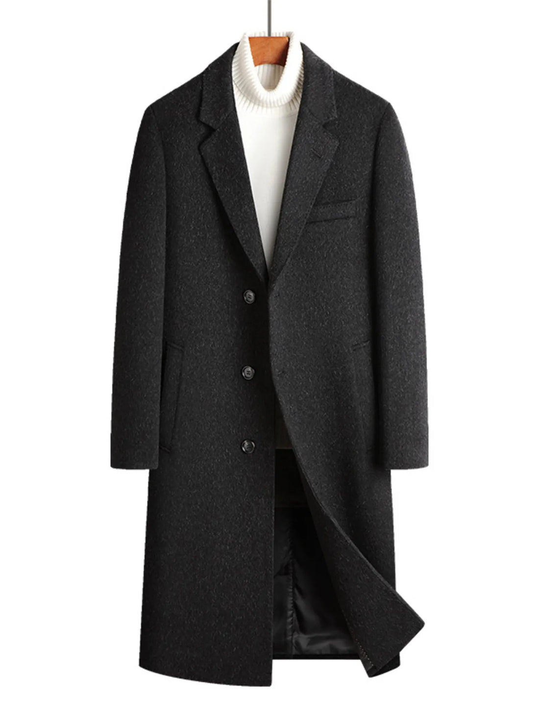 Men's dark gray longline wool buttoned overcoat with classic lapels and a white turtleneck.