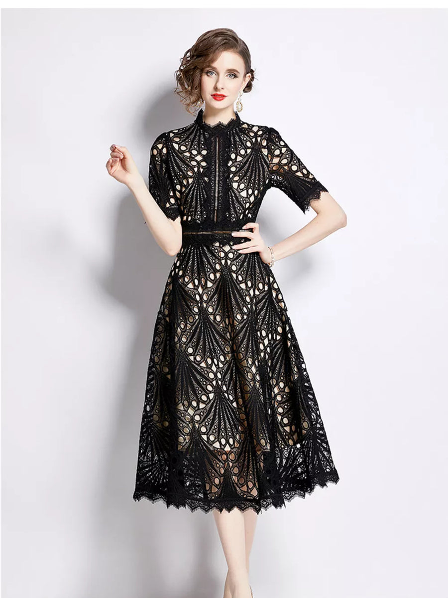 Elegant black lace midi dress with delicate sleeves and a-line cut.