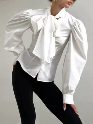 100% Cotton Care instructions: Machine wash cold blouse in optic white with fitted silhouette