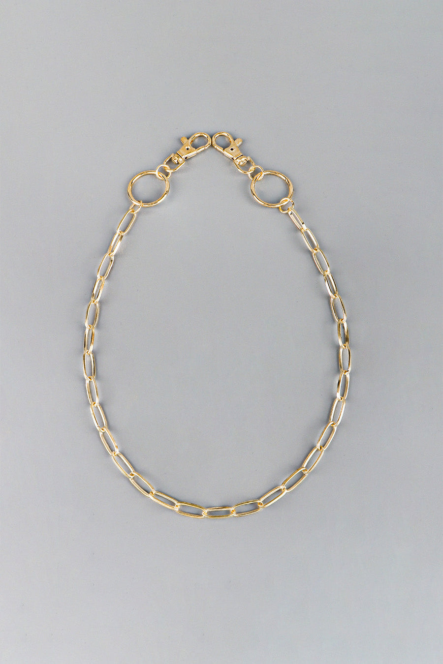 Gold chain wallet chain with lobster clasps and O-ring connectors for belts and pants.