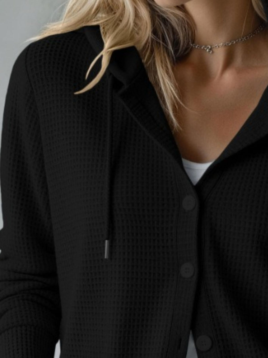 Yellow cardigan with hip-length and button-front