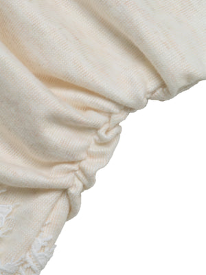 Cream ruched knit fabric with lace trim