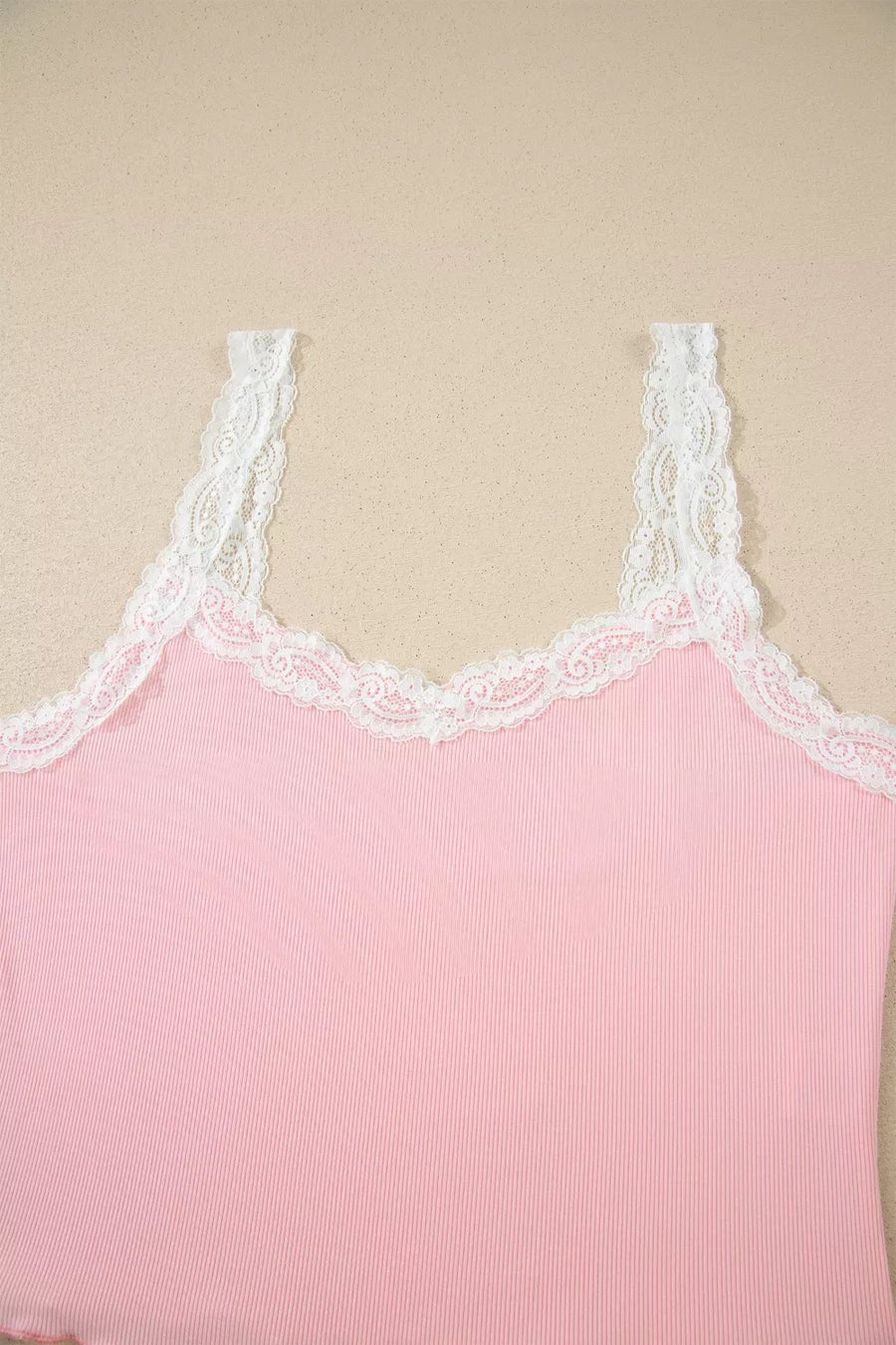 Pink ribbed cami with white lace trim and adjustable straps
