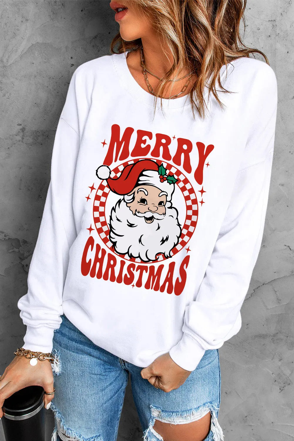 White crewneck sweatshirt with Merry Christmas Santa graphic and red checkered detail.