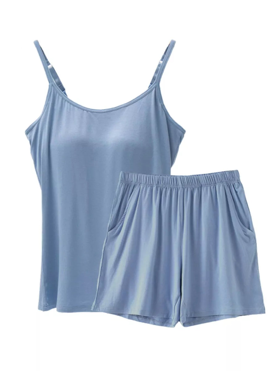 Light blue cami and shorts pajama set with adjustable straps and pockets.