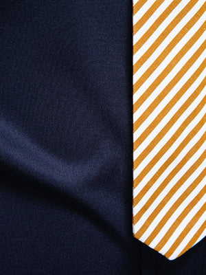 Men's navy blue cotton button-up shirt with a striped pocket detail.