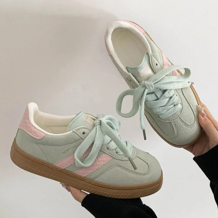 Retro suede trainers in pastel blue with pink stripes and gum sole.