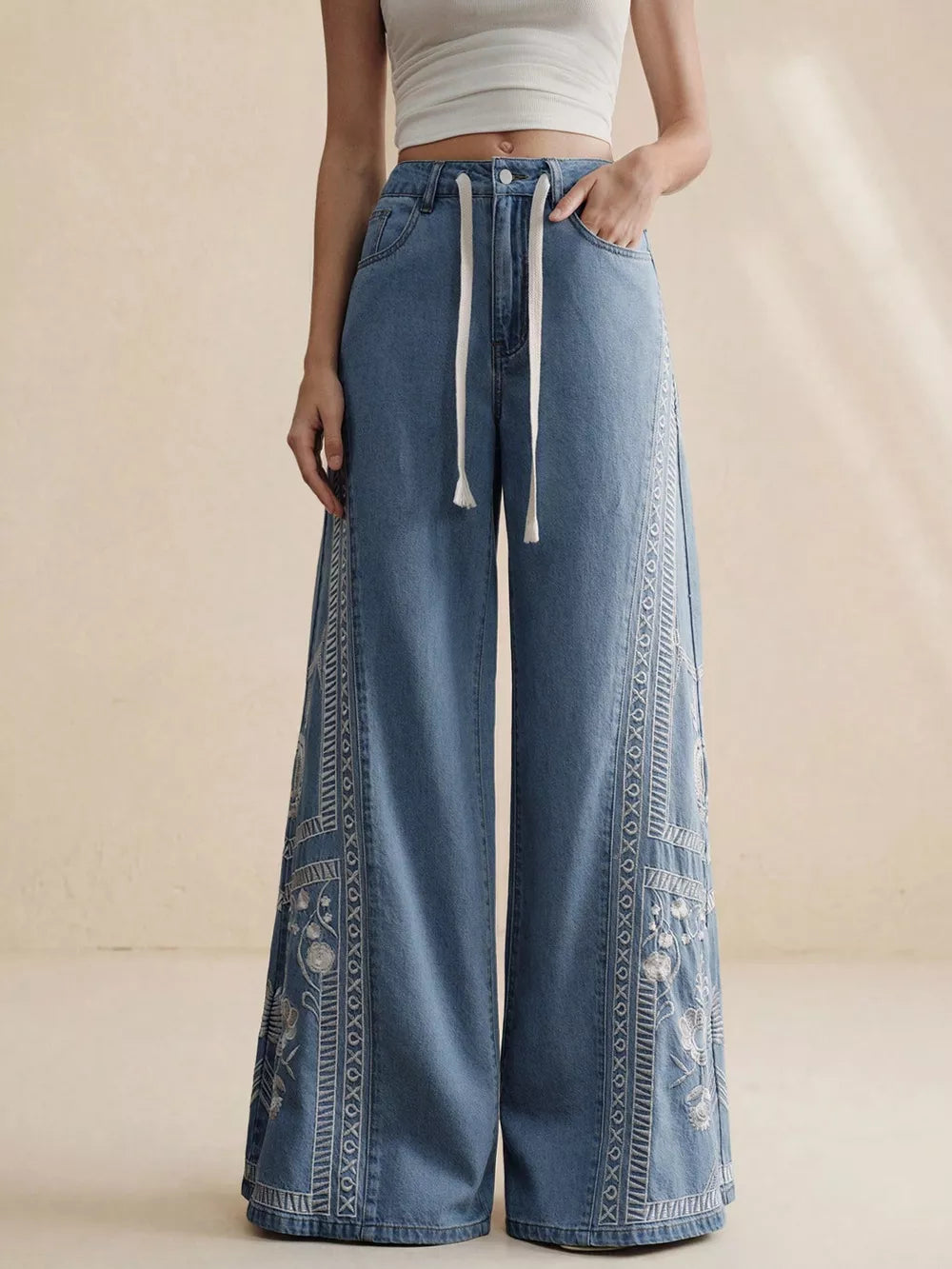 light blue denim wide-leg jeans with embroidered and N/A