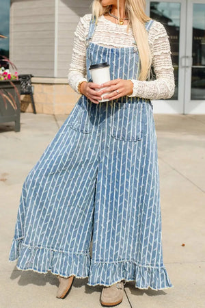 Striped distressed denim overalls with wide legs and ruffled hems.