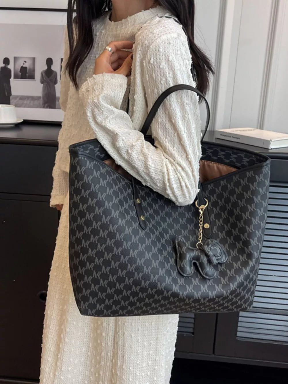 black tote with geometric and null