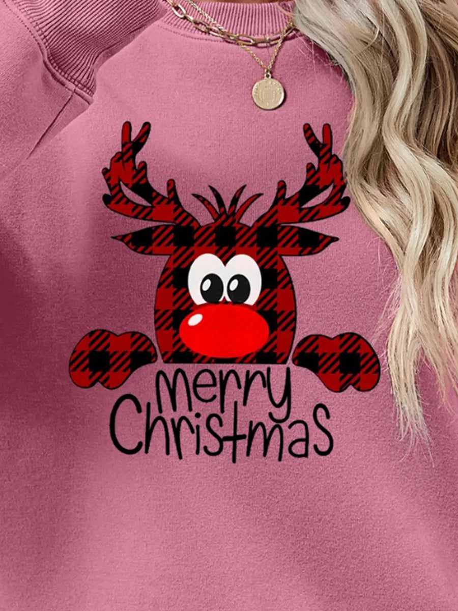 Plaid reindeer graphic crewneck sweatshirt in blush pink with Merry Christmas text.