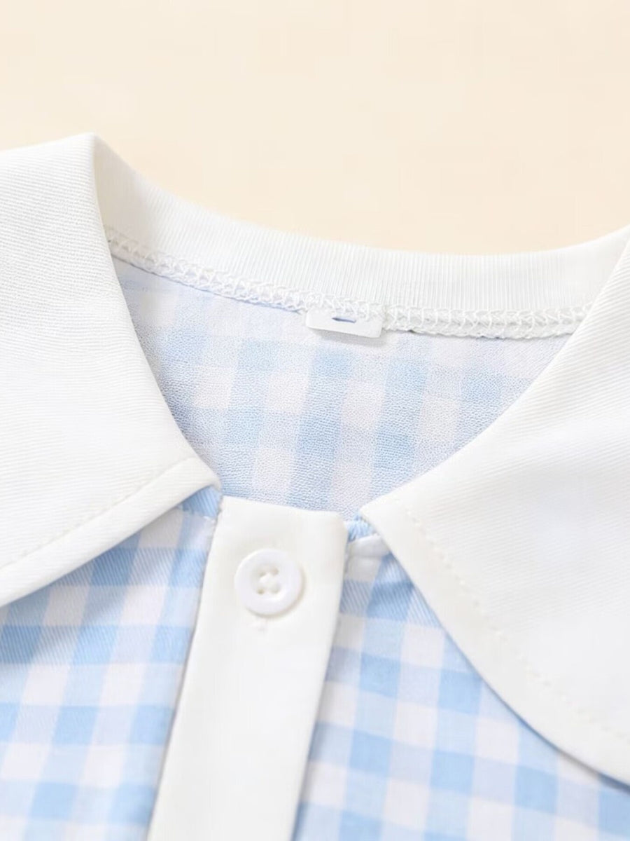 Sky blue gingham toddler dress with white collar and button detail.