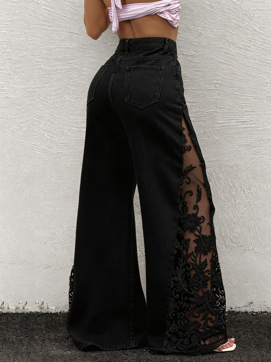 black wide-leg jeans with full-length and button and zip fly