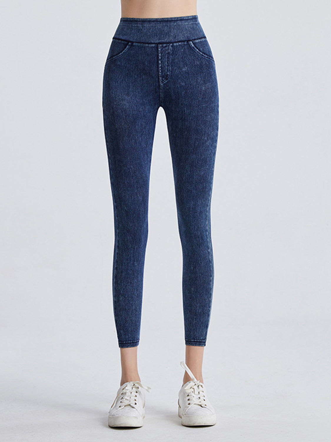 Denim illusion sculpt leggings in dark wash with faux pockets and a high waist.